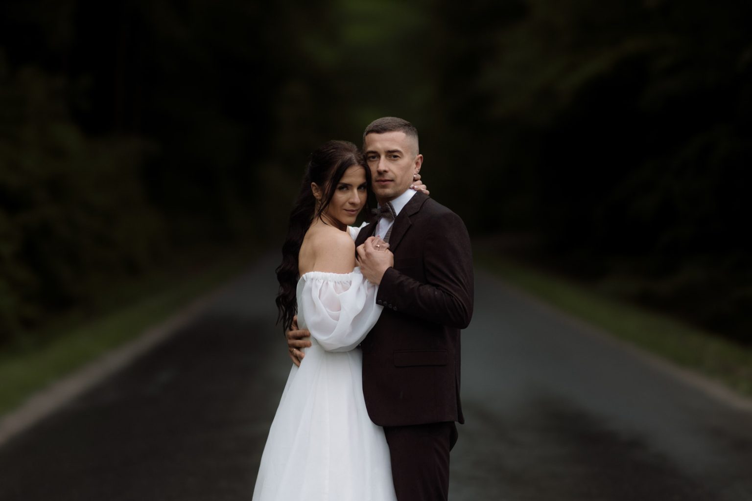 Anna and Maciej leaving their wedding ceremony